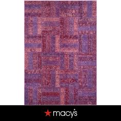 a purple and red rug with squares on it