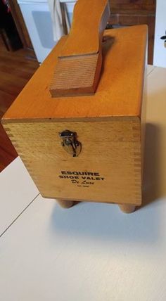 a wooden box sitting on top of a counter