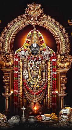 an idol is displayed in front of a black background with gold trimmings and candles