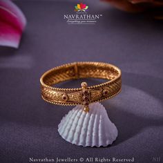 Embrace the timeless charm of antique heritage jewels, crafted delicately on 22k gold, for an exquisite touch of sophistication.  We are open from 10 am to 8 pm  𝐋 𝐨 𝐜 𝐚 𝐭 𝐢 𝐨 𝐧 : M.G. ROAD, JAYANAGAR, RAJAJINAGAR, C T STREET  For Enquiry: +91 9108701007  #navrathan #navrathanjewellers #thisisnavrathan #jewelry #jewellerydesign #JewelleryAddicts #jewellerylovers #expressyourself #jewelryaddict #antiquejewellery #antiqebeauty #timelesstreasures #luxuryjewellery  #bridaljewellery #antiquejewellery Delicate Gold Jewelry, Gold Bangles For Women, New Gold Jewellery Designs, Antique Necklaces, Indian Jewellery Design Earrings, Bangles Design, Black Beaded Jewelry