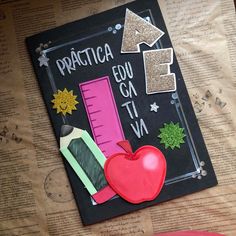 a chalkboard with some school supplies on it