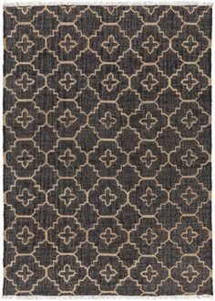 a black and beige rug with an intricate design