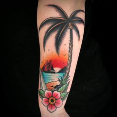 a palm tree with a boat in the ocean and flowers on it's arm