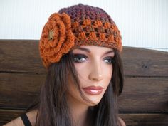 NEW - Winter Fashion Crochet Hat with Flower. Multicolored orange with burnt orange stripe and flower - Women / Teen hat - Winter fashion crochet hat. WOMEN / TEEN SIZE ONE SIZE SIZE: 22  "  inches circumference when stretch 4  1/2 "  inches diameter crochet flower YARN: Acrylic yarn COLOR: Multicolored orange burnt orange stripes Burnt orange BUTTON: Antique Gold button Care instructions: Hand wash only. Lay flat to dry. Air dry only. Crochet Hat Women, Crochet Hat Winter, Winter Fashion Accessories, Winter Accessories Fashion, Women Beanie, Crochet Winter Hats, Flower Women, Womens Hat, Dry Air