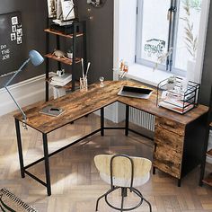 a wooden desk sitting on top of a hard wood floor