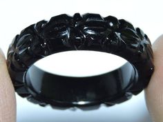 Buyer will receive 1 Piece Natural Black Obsidian Carved Band/ you will really love it.you will gift it to your love ones and friends. Product Details Product Name - Natural Black Obsidian Carved Band Gemstone - Natural Black Obsidian Quantity - 1 Piece ----------------------------------------------------------------------------- THIS BEAUTIFUL ITEM IS AVAILABLE ONLY ON ETSY ------------------------------------------------------------------------------------ Note - Kindly choose your required ri Black Carved Round Rings, Carved Black Rings As Gift, Carved Black Rings For Gift, Black Carved Ring Jewelry, Black Carved Round Jewelry, Black Obsidian Ring, Engagement Ring Band, Obsidian Ring, Amethyst Quartz