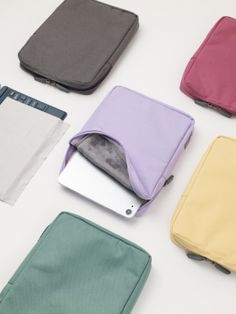 Editor's Notes11 in. Tablet Pouch and Screen Cloth Set. This simple and colorfulpouch is perfect for protecting your tablet device. Filling andinternal microfiber lining protect the device from external shocks andscratches, and a complimentary screen cloth comes with the set. The pouch ismade with a strong material that is stain and water-resistant. Thereis also plenty of extra space to store additional belongings.  - Waterprooffabric and thick lining- Double zipper Velboa Fabric, Pc Sleeve, Tablet Pouch, Cleaning Cloths, Waterproof Coat, Macbook Sleeve, Ipad Sleeve, New Ipad, Ipad Tablet