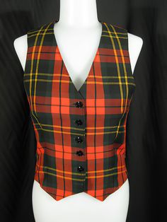 "Early 1970s wool plaid vest by Anne Klein with the Lion head label. A timeless style in a classic plaid and perfectly detailed, the vest is about a size 2. It measures approx. 11\" across the shoulders, 32\" bust, 26\" waist, 20\" length to the point ends in front, and 18 1/2\" length in back. It's in excellent, like new, condition. See my entire shop collection here https://www.etsy.com/shop/RobinClaytonVintage" Plaid Vest For Fall, Plaid Sleeveless Vest For Fall, Classic Plaid Vest For Fall, Vintage Vest For Tailoring In Fall, Vintage Tailored Vest For Fall, Vintage Vest For Fall Tailoring, Fitted Plaid Vest For Winter, Retro Fitted Vest For Fall, Fitted Retro Vest For Fall