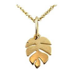 14 Karat Yellow Gold Leaf Pendant Necklace This beautiful necklace features a small 14K yellow gold leaf pendant paired with a 14K yellow gold chain! Chain length: 18" (Adjustable to 16") Leaf pendant: 8.3mm X 6.22mm X 1.0mm Weight: 1.17 dwt/ 1.82 g Hallmark: 14K Very good condition, professionally polished. Will come packaged in a gift box or pouch (when possible) and will be shipped U.S. Priority Mail Insured. MM091724/17KCS Gold Leaf Pendant, Yellow Gold Chain, Leaf Pendant, Beautiful Necklace, Gold Leaf, Chain Lengths, Priority Mail, Gold Chain, Beautiful Necklaces