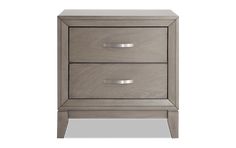 an image of a nightstand with two drawers on the bottom and one drawer closed up