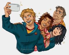 a group of people taking a selfie with a cell phone