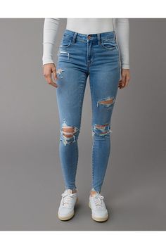 Next Level Stretch/Our softest, stretchiest, never-loses-its-shape denim/Won't bag out. Ever./Medium wash/Ripped Cheap Ripped High Waist Jeans, Cheap Ripped Medium Wash Jeggings, American Eagle Jeans Ripped High Waisted, Ripped Jeans American Eagle, American Eagle Jeans Ripped, Aerie Bras, American Eagle Outfits, American Eagle Jeans, Cute Jeans