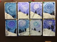 four pieces of art made to look like snow covered mountains and trees with stars in the sky