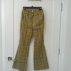 Never Worn, 70's Style Flare Pant. Very Cute, Just Not My Style And Haven't Had An Opportunity To Wear! Retro Yellow Pants For Fall, Yellow Full Length Bottoms For Fall, Yellow Retro Pants For Fall, Urban Outfitters Vintage Bottoms For Spring, Vintage Urban Outfitters Bottoms For Spring, Spring Vintage Bottoms From Urban Outfitters, Retro High Waist Yellow Bottoms, Fitted Yellow Bottoms From Urban Outfitters, Vintage Wide Leg Yellow Bottoms