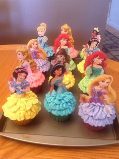 there are many cupcakes that have princesses on them