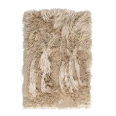 a beige shaggy rug on a white background