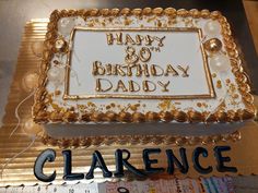 a birthday cake with the words happy 80th birthday daddy written on it in gold and white frosting