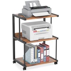 a computer desk with printer, scanner and other office supplies on it's shelf