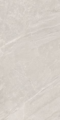 a white marble textured surface with grey veiners