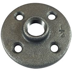 an iron plate with holes in the middle