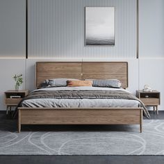 a large bed sitting next to two nightstands on either side of the bed in a bedroom