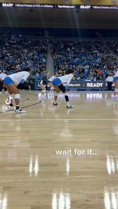 two women in blue and white uniforms on a basketball court with the words, this play made it on sportscenter wait for it