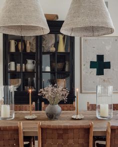 This dining room design combines bohemian and rustic interior design elements to create a space that is truly unique and full of personality. A neutral color palette keeps it grounded, and lots of texture, including our woven leather dining room chairs, keep the space interesting to the eye. Credit: @paige_amodernrustichome