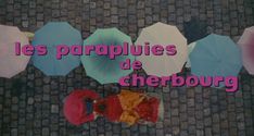 several open umbrellas on the ground with words in french above them that read, les parapuies de cherbourg