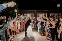 a bride and groom are showered with confetti at their wedding