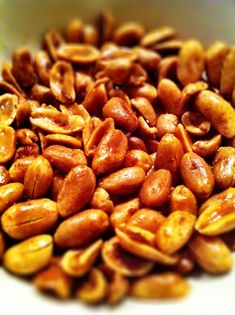 a pile of nuts sitting on top of a white table