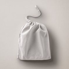 a white bag sitting on top of a table