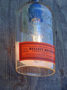 an old fashioned bottle hanging from the ceiling