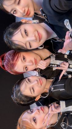 three young women standing next to each other