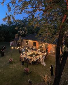 an aerial view of a wedding reception in the evening