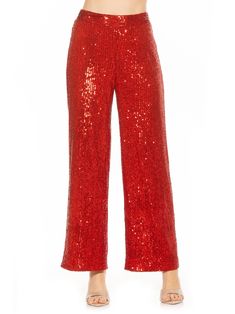 Enhance your fashion statement with the luxurious Illy Sequin Pants. These high waisted pants feature a glamorous wide leg design and full sequin embellishments for a tasteful and exclusive look. Stand out in style and sophistication with Illy. Cole Haan Women Shoes, Christmas Pants, Sequin Flare Pants, Sequin Material, Sequin Pants, 70s Disco, Red Fits, Concert Looks, New Years Eve Outfits