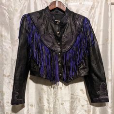 Rare Find. I Actually Got This Here On Posh A While Back And There's A Funny Story That Comes W It But I'll Spare Those Details For Now. Worn For A Costume Party Only Once. Semi Cropped, Size Large, Genuine Thick High Grade Leather, 100% Pimpin. The Detail Work Is So Ornate & Exquisite, The Purple Fringe Against The Black Makes It Pop Beautifully & You Can't Help But Feel Like A Boss Baller While Wearing This Piece Purple Fringe, Semi Cropped, Funny Story, Like A Boss, The Purple, Funny Stories, Costume Party, Purple And Black, High Grade