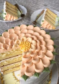 the cake is decorated with flowers and leaves