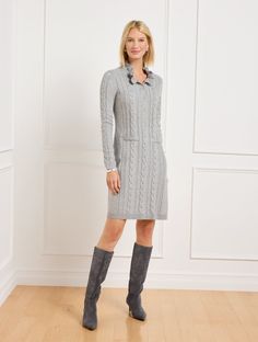 Pull on an understated luxe style with our ultra-comfy sweater dress. Crafted in a soft cotton blend with a classic cable knit detail at the front. Features chic ruffles at the mockneck and a buttoned half-placket for easy styling. Features Shift Dress Mockneck Long Sleeve Button half placket closure Hits Above Knee Imported Fit: Misses: 37"; Petite: 34 1/2"; Plus: 39"; Plus Petite: 37" Material: 57% Cotton, 28% Acrylic, 15% Polyester Care: Machine Wash Cold; Only Non-Chlorine Bleach When Needed; Reshape, Lay Flat To Dry; Cool Iron, If Needed | Ruffle Neck Cable Knit Sweater Dress Talbots Clothes Over 50, Knitted Dress Outfit, 70 Outfits, Petite Clothes, Best Places To Shop, Cable Knit Sweater Dress, Places To Shop, Classic Style Women, Comfy Sweaters