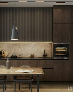 a modern kitchen with wooden cabinets and counter tops, along with a dining room table