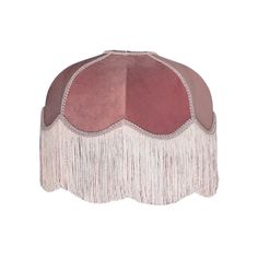 a pink and brown ottoman with fringes on the top, sitting in front of a white background