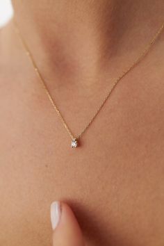 "Our newest dainty prong set solitaire diamond necklaces. Truly a minimalistic design that you can enjoy for a lifetime. We only work with real natural diamonds and real solid gold to ensure the best quality possible. * Features of the Necklace  ✔ Gold Kt: 14K Solid Gold - All pieces would be stamped for authenticity ✔ Available Gold Colors: Yellow Gold, White Gold, Rose Gold ✔ Center Diamond Weight: 0.09 carat  ✔ Diamond Color-Clarity: G Color VS/SI Clarity ✔ Center Diamond Diameter: 2.85 mm  ✔ Simple Bridal Necklace Gold, Dainty Gold Necklace With Diamond, Petite Diamond Necklace, Dainty Gold Diamond Necklace, Minimalistic Gold Necklace, Small Dainty Jewelry, Diamond Necklace Pendant Ideas, Simple Gold Diamond Necklace, Simple Dainty Jewelry