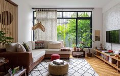 the living room is clean and ready to be used for relaxing time on the couch