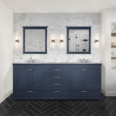 a bathroom with double sinks and two mirrors on the wall next to it is tiled flooring