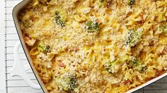 a casserole dish with broccoli and cheese