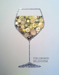 a wine glass filled with lots of buttons