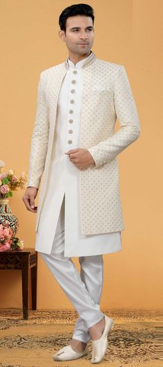 White and Off White color IndoWestern Dress in Art Silk fabric with Embroidered, Sequence, Thread work : 1861714 Geometric Embroidered Kurta For Eid Wedding, Geometric Embroidery Kurta For Wedding And Eid, Traditional Long Sleeve Sherwani With Geometric Embroidery, Elegant Festive Kurta With Geometric Embroidery, Geometric Embroidery Kurta For Wedding On Eid, Geometric Embroidery Kurta For Eid Wedding, Festive White Kurta With Geometric Embroidery, Geometric Embroidery Sets For Wedding And Eid, Festive Sherwani With Geometric Embroidery And Long Sleeves