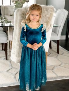 Size Small will be available restocked Tuesday December 10th. The Brave Princess Teal Couture Costume Dress Our beloved Brave Princess represents the first independent princess who made her own happy ending, and the Celtic inspired dress we made in her honor does her justice. Your princess will be ready for adventure and to take on the world just like Princess Merida! We have designed a long sleeve dress made of soft and stretchy deep teal velvet. The dress features a gold trim around the neckli Joy Costume, Brave Princess, Gold Tulle, Princess Merida, Up Costume, Teal Velvet, Long Sleeve Design, Happy Ending, Up Costumes