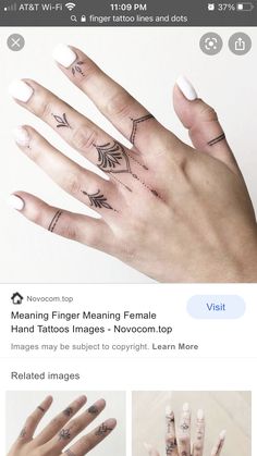 an image of someones hand with tattoos on it, and the caption below