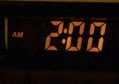 a digital clock with the time 11 00 pm