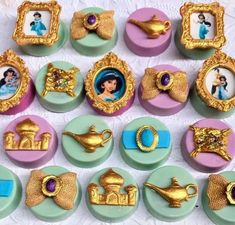 there are many different types of brooches on the table together, including princesses